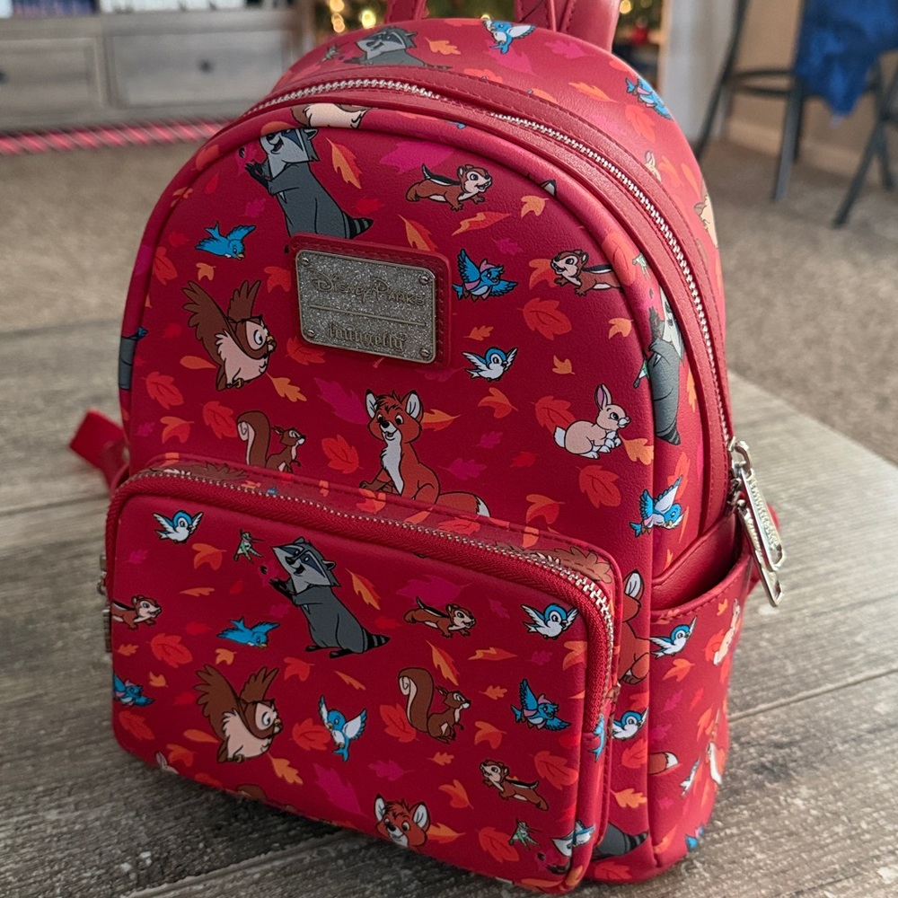 NWT Loungefly Disney Parks pinkish-red critters all over print mini backpack